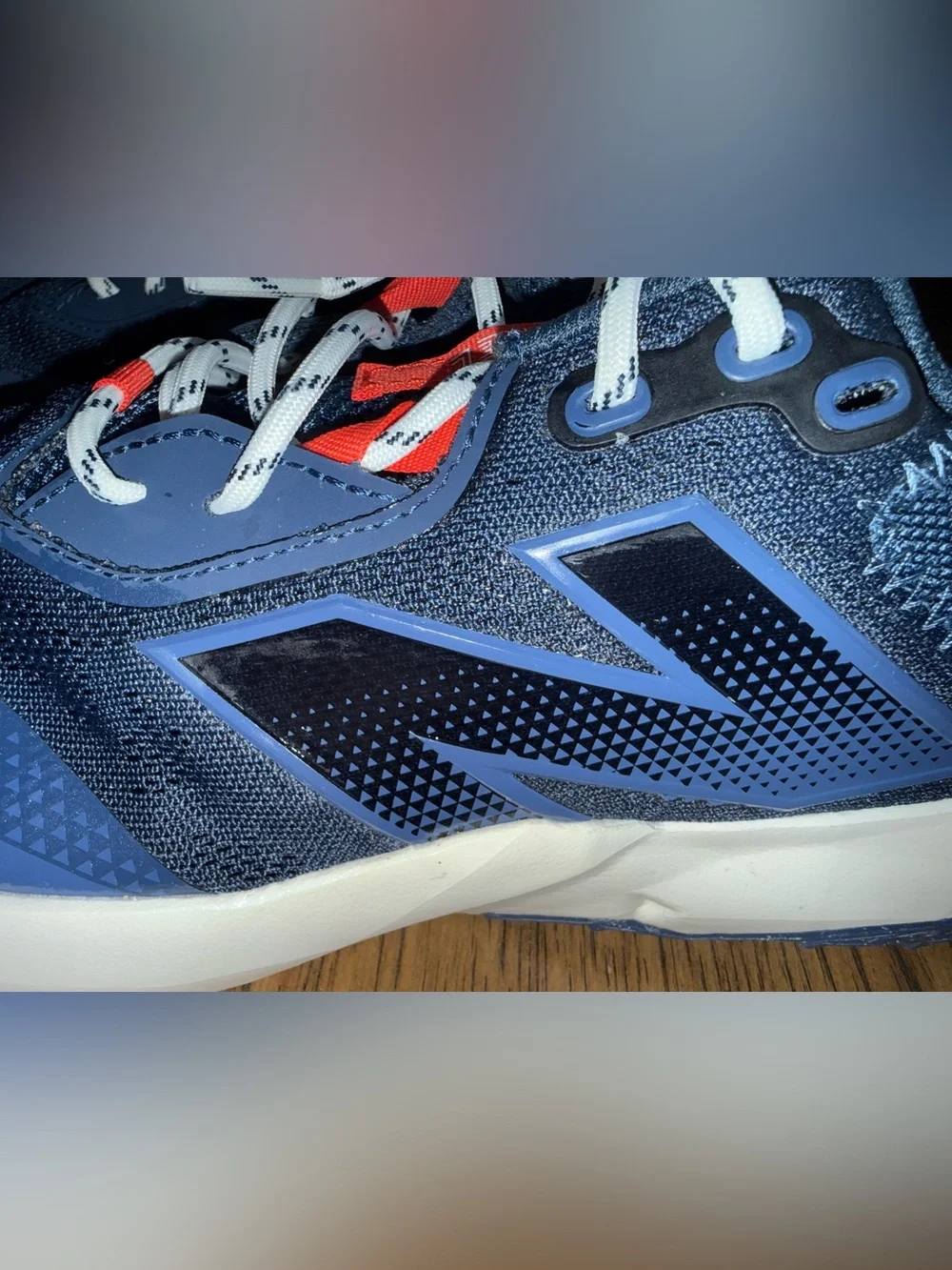 New Balance Navy and Red Sneakers